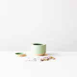 The style of these small pastel ceramic jars is minimalist and mineral, geological and geometric. With an eye for detail and color that add a perfect dose of poetry. Use them to store sugar, spices, herbs, tea, bulk food, etc. 