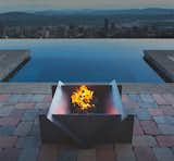 Stahl Firepit

Leave fire pits made from dirt and large rocks to camping. The Stahl Firepit is a solid look for any modern back yard. And it’s made of solid steel but with a twist. Each piece is separate—it’s not welded, making the strategically laser-cut pieces easy to take apart and put together when necessary. And while it’s difficult to compete with the natural elements of dirt and rocks, Stahl kept it free of artificial treatments by intentionally avoiding powder coating. Let it weather gracefully, says the Portland company. It’ll look better with age.