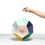 Themis Mono

Themis Mono is anything but singular. The 12-inch colorful polygon is a dodecahedron, a 12-sided geometric shape. Graphic designer Clara Von Zweigbergk added the 12-sided piece to her Themis Mobile collection, which includes mobiles with a variety of multi-sided polygons. Each side of these wood free paper products has a different color, handpicked by the artist. Sound like fun? Even better, Themis arrives flat and the recipient gets to fold and fold to create 3D shapes.