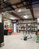 This room is a far cry from the overcrowded garage the homeowners previously managed. But it was difficult for them to find a house that was just the right size with an oversized garage. "That was a huge component of why we ended up building a house," said the cycling coach who now delights in his private, bike maintenance facility.&nbsp;