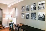 Across one wall Ferrer displayed a collection of black and white family photos created on aluminum by WhiteWall, a German company specializing in gallery-quality prints.