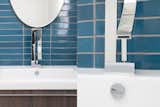 Heath Ceramics Tile in Opal Pacific, paired with modern fixtures and vanity.