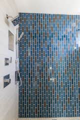 Heath Ceramics tile feature in one of two Master Suite Bathrooms. The color palette was inspired by Lake Tahoe.
