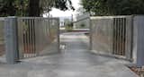 A welcoming arrival with custom stainless steel gates