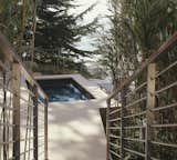 Outdoor, Shrubs, Small, Stone, and Metal Steps away from the inviting spa  Outdoor Small Metal Stone Photos from On the Edge