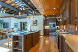 The kitchen  with a view to the vaulted dining room