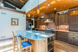 Kitchen with Van Gogh granite and Lacanche Range