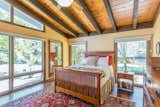 Master bedroom with views of the barn, and backyard.