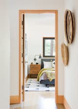 Bedroom, Night Stands, Bed, and Light Hardwood Floor  Photo 18 of 21 in Woodsy Tahoe Cabin by Regan Baker Design