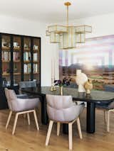 Dining room; custom cabinetry built to be flush with the wall.