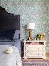 Primary bedroom; vintage brass lamps on custom Paul Ferrante nightstands.