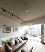 Living Room, Sofa, Ottomans, Ceiling Lighting, and Medium Hardwood Floor  Photo 6 of 10 in Indoor / Outdoor from Woollahra Residence II