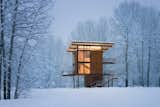 Seattle firm Olson Kundig Architects described this three-story cabin in upstate Washington as "basically a steel box on stilts." The 1,000-square-foot structure can be completely sealed off with four 10-by-18-foot steel shutters that are rolled over the glass windows when visitors clear out.