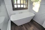 Aquatica Arabella-L-Wht™ Large Corner Solid Surface Bathtub
