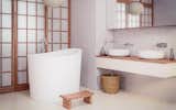 Aquatica’s True Ofuro Mini Japanese soaking tub was designed in response to customers' requests for an even smaller version of True Ofuro soaker tub! This modern interpretation of an ancient Japanese bathing tradition is crafted in Italy from the brand's signature AquateX™ solid surface material. Its space-conscious footprint of 43" x 43" (1090mm x1090mm) makes it an ideal option for condos and small bathrooms, while its tall design provides a deep, full-body soak. True Ofuro Mini features a slightly elevated rim for improved neck and head support, as well as an ergonomic built in seat, allowing the body to be comfortably emerged to maximum water capacity. Optional teak wood step available for easier access into the tub.