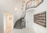 The home’s original magnesite staircase leads to the perfect family floor plan.