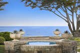 A tranquil water feature set against the sweeping coastline