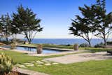 Outdoor, Trees, Grass, Back Yard, Gardens, Walkways, Hardscapes, Large Pools, Tubs, Shower, and Swimming Pools, Tubs, Shower  Photo 10 of 11 in A Monumental Oceanfront Estate on the California Coast by Luxury Homes & Lifestyle