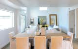 The dining room captures light from multiple directions. 
