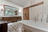 The elegantly designed master bath with free-standing soaking tub. 