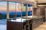 The custom-fabricated, Italian Del Tongo chef’s kitchen looks onto the sweeping cityscape.