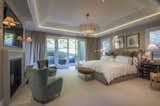 The oversized master suite with a private hillside patio and fire pit. 