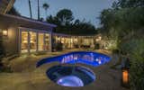 Tranquil and private grounds include a newly remodeled pool and spa and Zen-like side patio area with a flowing water fountain.
