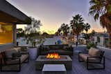 A sweeping rooftop terrace, complete with a bar and fire pit, overlooks Abbot Kinney.