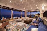 Grand-scale living areas feature automatic pocket doors throughout, which create an effortless indoor-outdoor flow to the infinity pool and ocean beyond.