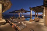 Entertaining spaces assume a romantic glow at night.