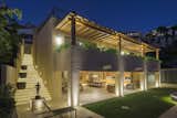 Incandescent, ambient and accent lighting sets the mood, both inside and out.