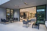 Gracious outdoor entertaining areas with overhead heaters serve as a natural extension of the interiors.