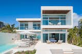 The open concept, four-bedroom residence spans 8,260 square feet, with 5,215 square feet under roof and 3,655 internal square feet.  Photo 1 of 8 in An Oceanfront Villa in Turks & Caicos Redefines Luxury Living on the Caribbean Island by Luxury Homes & Lifestyle