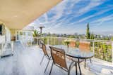 Expansive terraces are ideal for year-round entertaining.  Photo 8 of 11 in Former Home of Bugs Bunny Creator Dazzles in the Hollywood Hills by Luxury Homes & Lifestyle