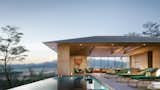 The infinity-edged pool and sundeck, situated off the great room. 