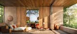 A master bedroom suite with private terrace and up-close views of the leafy jungle trees.