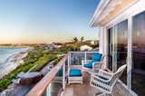 Balconies overlook the stunning coastline.