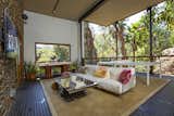A large, covered patio off the master suite serves as the ultimate al fresco retreat.