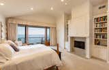 The master bedroom suite features a fireplace and private, ocean-view terrace.