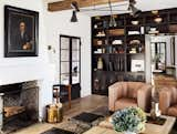 Built-in bookshelves, wide-plank French oak floors and refinished ceiling beams elevate the interiors.