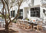 Outdoor dining spaces are ideal for the California lifestyle, graced by 16-foot imported olive trees.