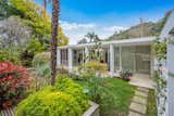 Lush landscaping elevates the experience.