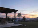 Breathtaking sunsets are on full display from the home's north terrace.