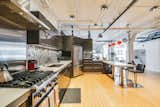 Kitchen  Photo 2 of 7 in A 1920s Arts District Loft Undergoes a Stunning Modern Transformation by Luxury Homes & Lifestyle