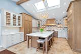 A renovated gourmet kitchen is one of the many amenities offered at this exclusive estate.
