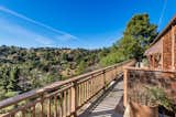 The surrounding outdoor deck is ideal for entertaining while taking in the breathtaking sunsets over the city and lower canyon.