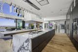 This one-of-a-kind, 9,418-square-foot property boasts an impressive menu of amenities.
