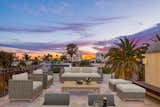 Outdoor One of the crown jewels of the home is its expansive outdoor lounge areas and spacious rooftop deck, which boast 360-degree views of the city and the canals.   Photo 3 of 5 in A Tuscan Contemporary Estate on the Banks of the Venice Canals by Luxury Homes & Lifestyle