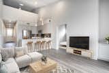  The home was outfitted with luxury wood-grain finish flooring, stainless steel appliances, quartz countertops, and sophisticated high-end fixtures with beautiful details throughout. 