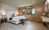 Four guest rooms are located in the upper level including the master suite.